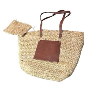 Wicker sturdy purse with separate zipper pouch and brown accent pockets. NWOT